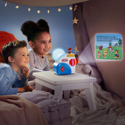 Children sitting in a cozy room with a Little Tikes toy and night light
