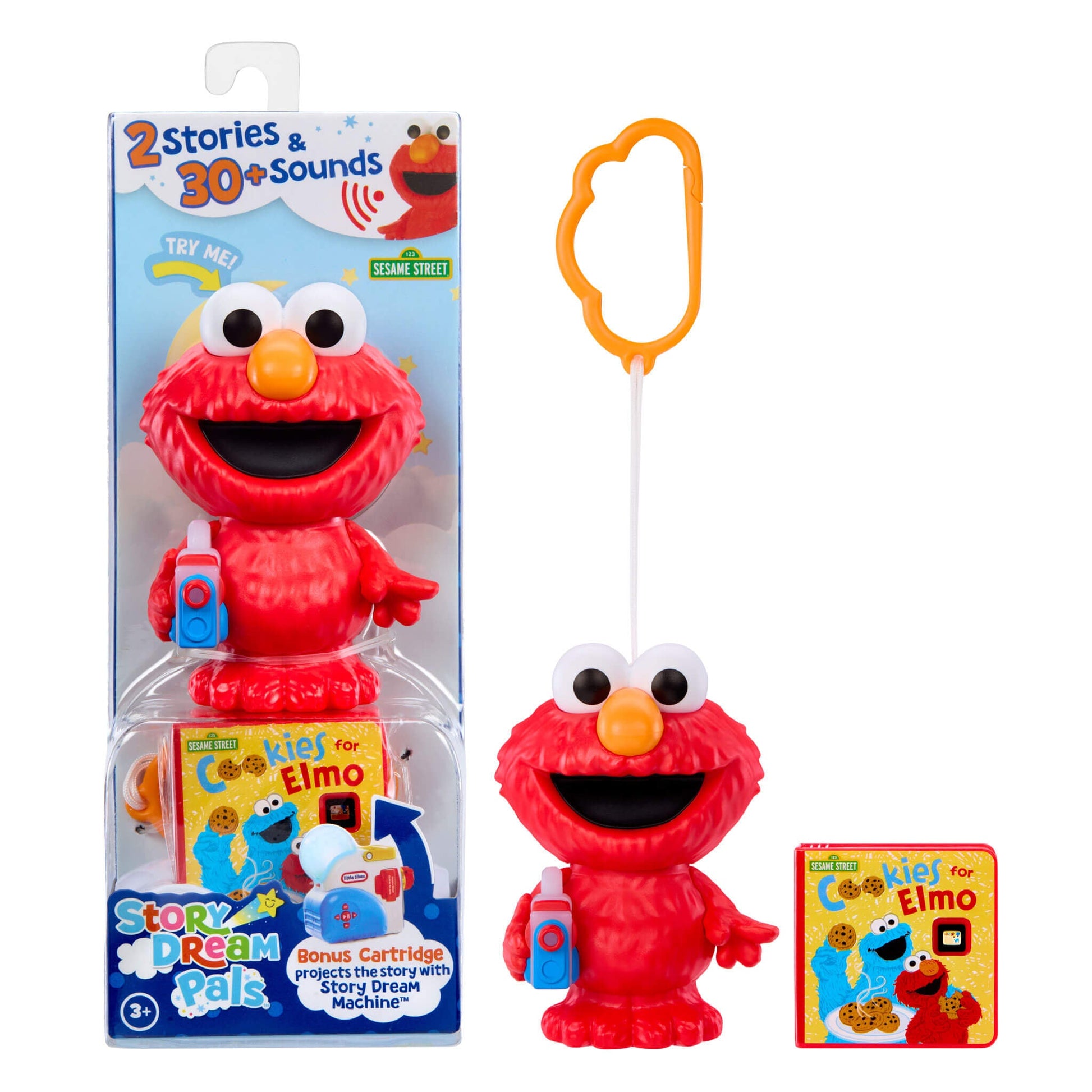 Elmo Sesame Street character toy with packaging and book on a white background