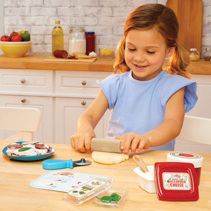 Girl rolling out the dough