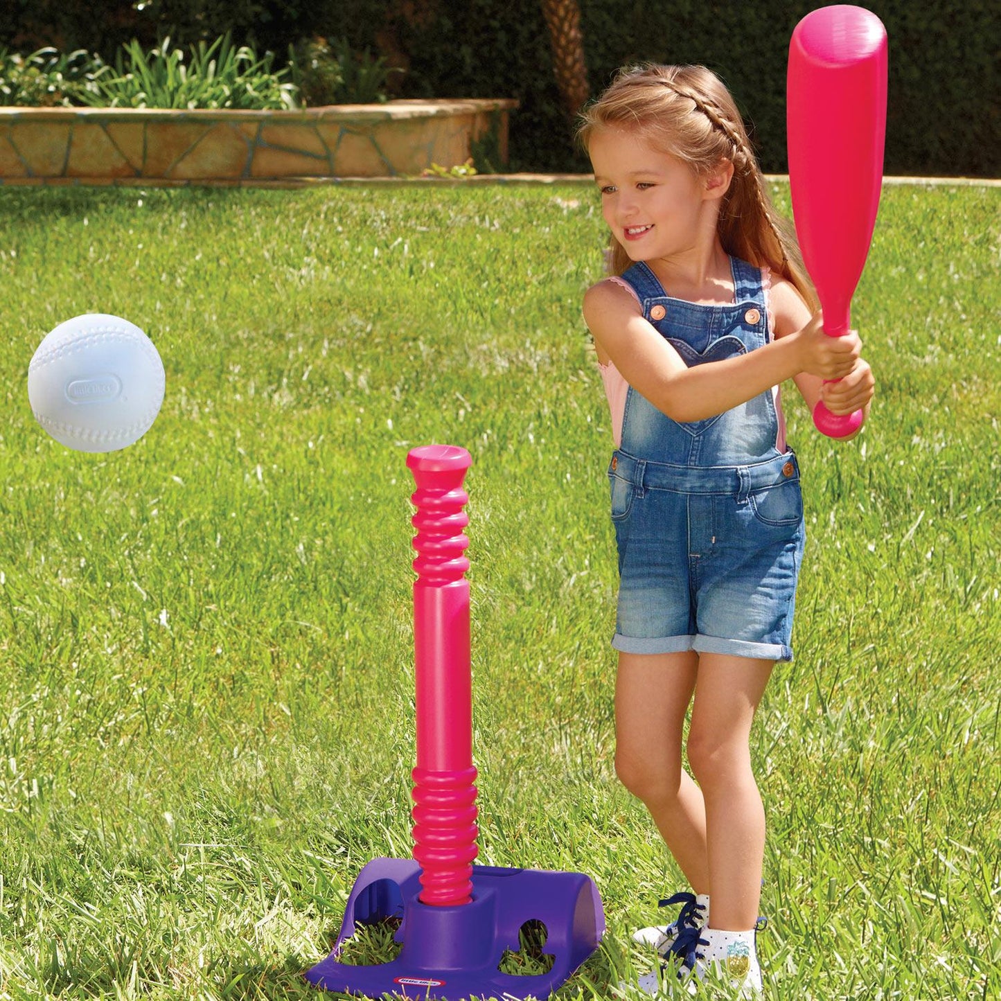 Girl hitting ball