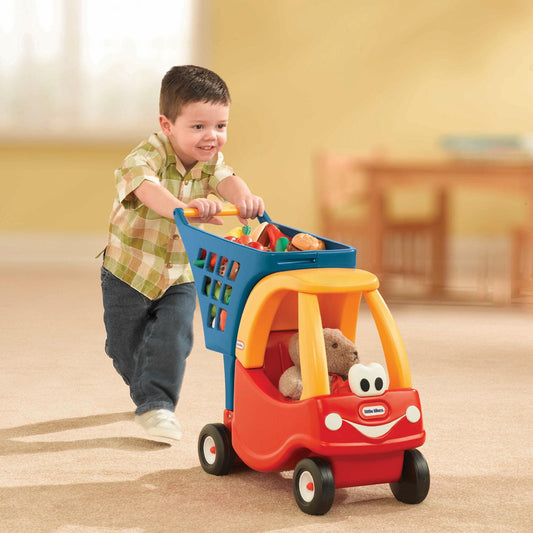 Boy playing with the shopping cart