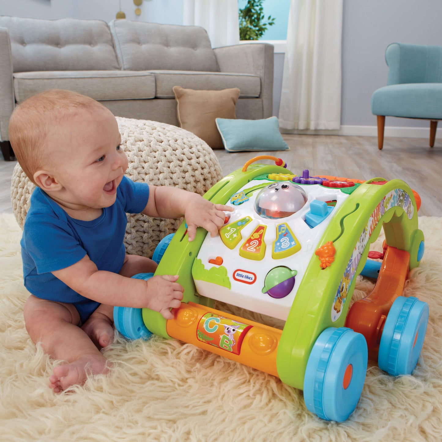 Walker folds down for floor time activity