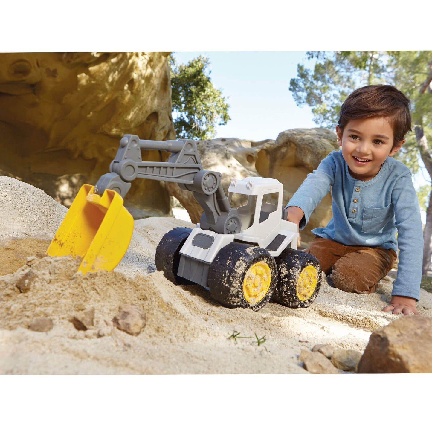Boy pushing Excavator