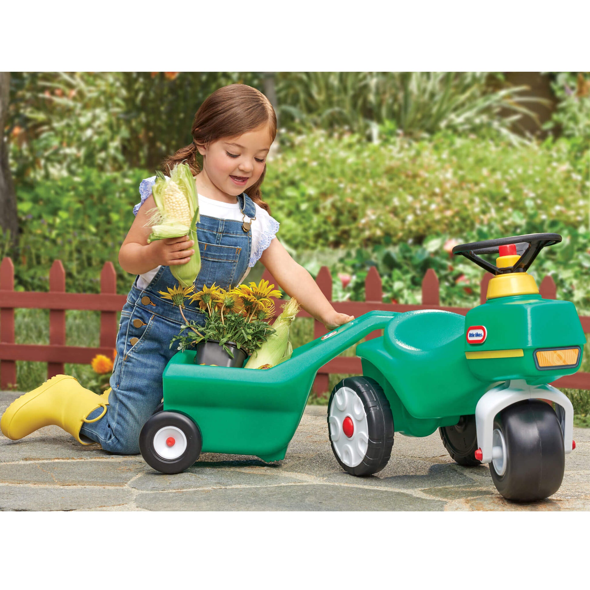 Girl putting flowers into the cart