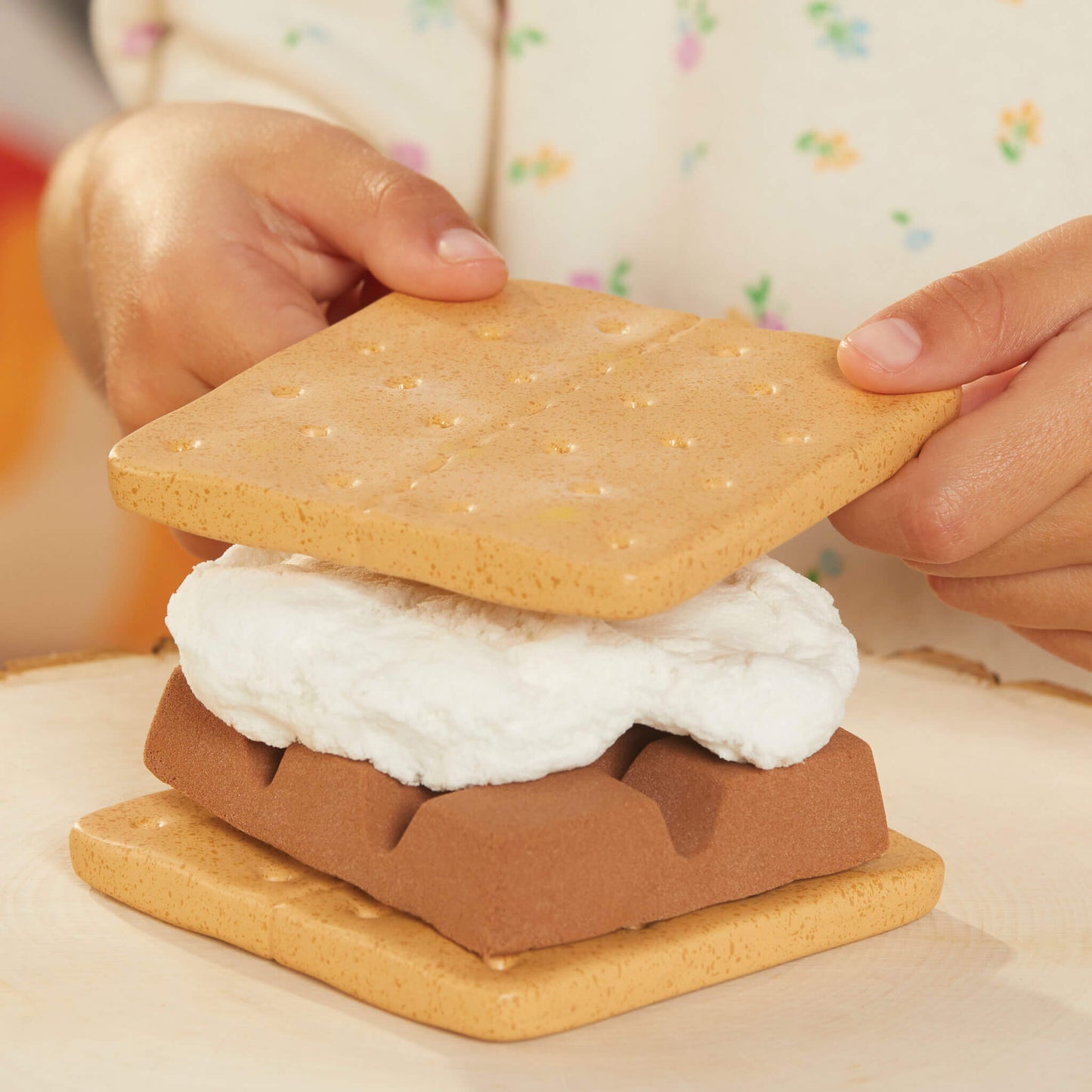 Toy s'mores set with two graham crackers and a marshmallow