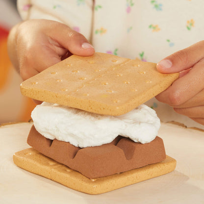 Toy s'mores set with two graham crackers and a marshmallow