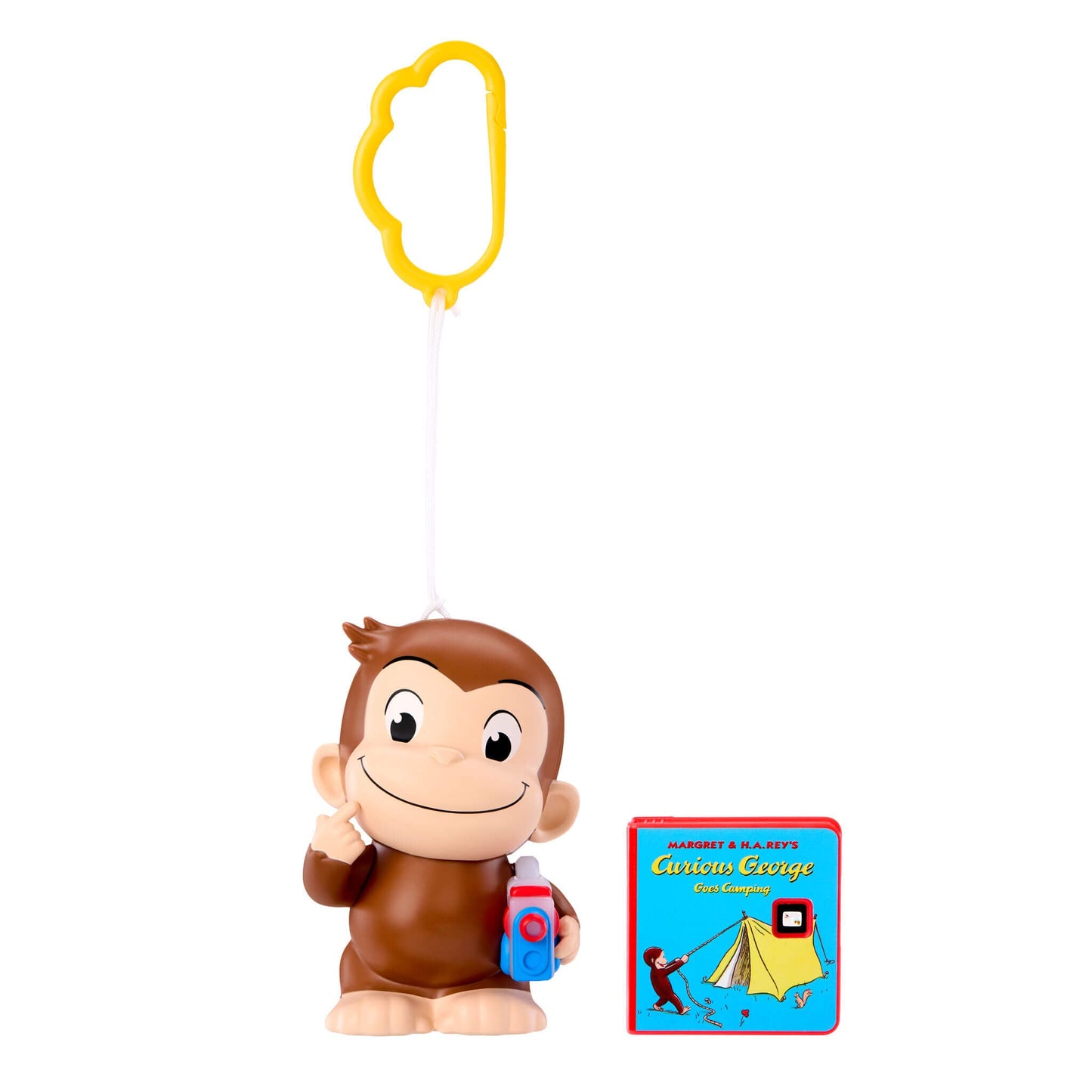 Curious George toy with a yellow cloud keyring, and a small Curious George book on a white background.