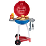 Grill with food, utensils and condiments