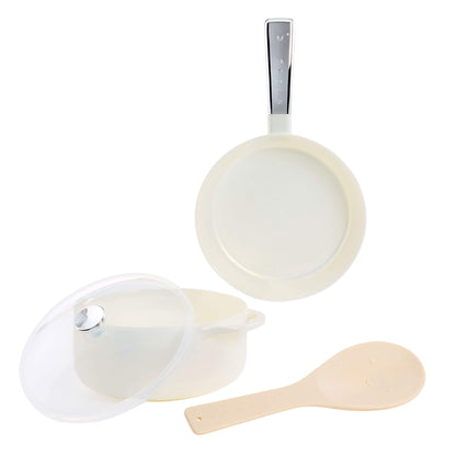 White-colored cookware set including a frying pan with a silver handle, a saucepan with a clear lid, and a spoon, displayed on a solid white background.