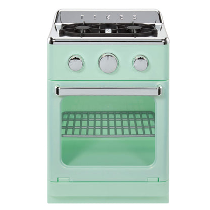 A mint green toy retro-style stove oven with silver knobs and a glass door, shown on a white background