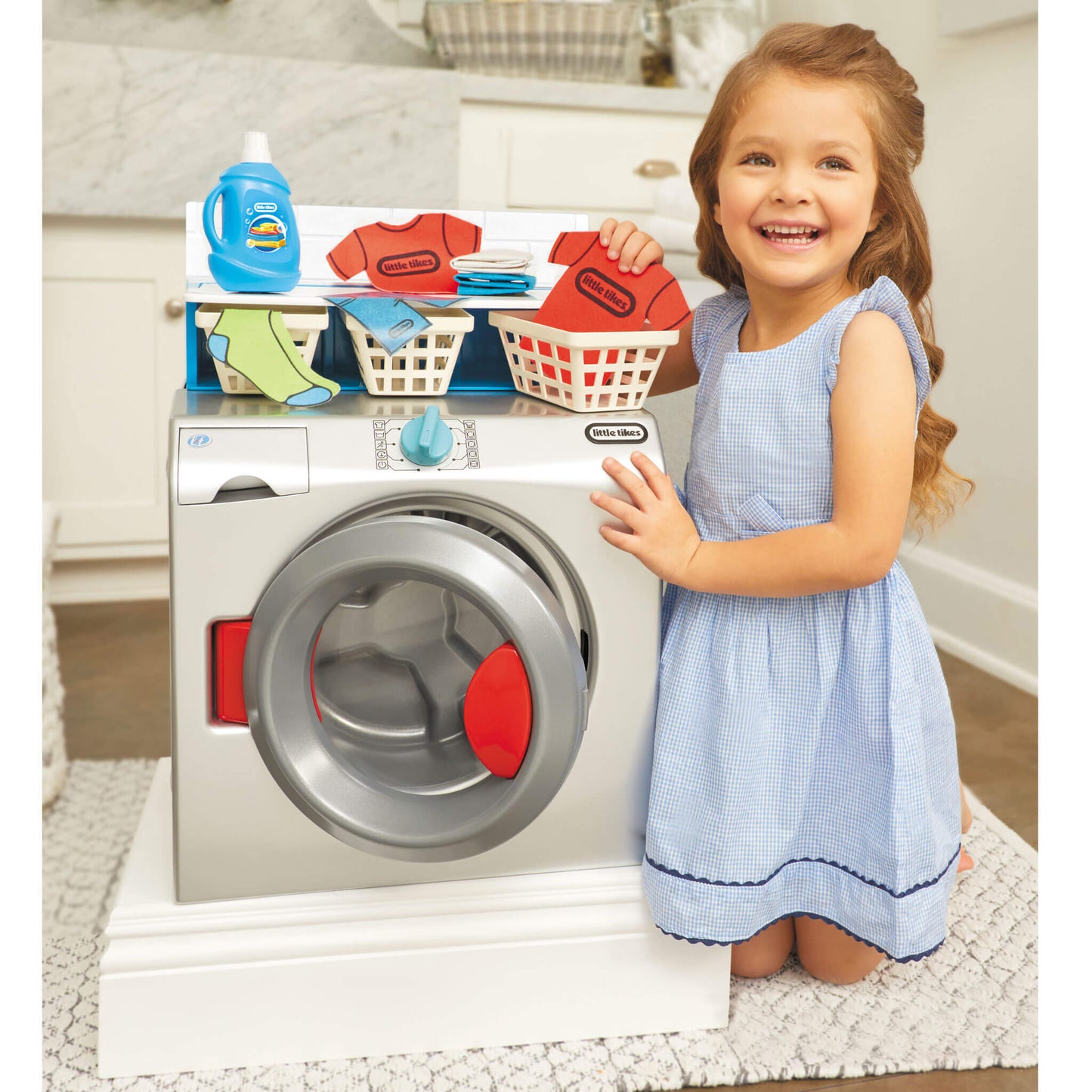 Girl playing with the dryer