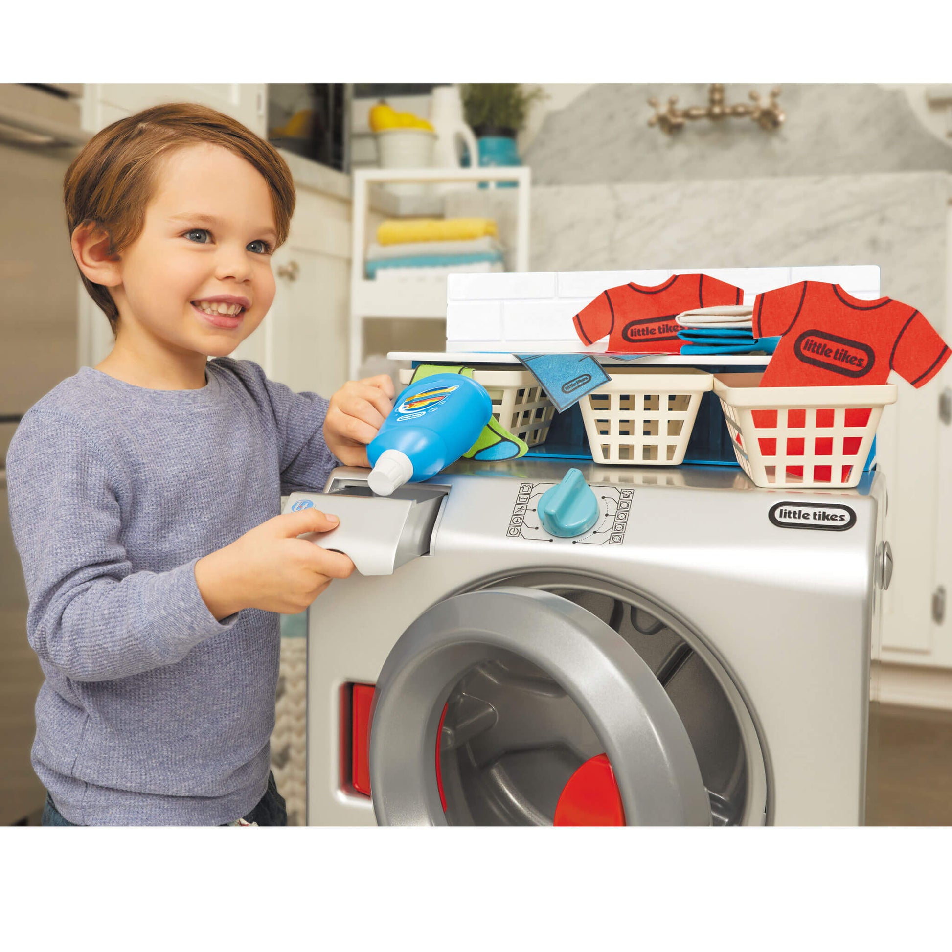 Boy adding detergent