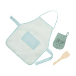 Children's apron with a matching oven mitt and wooden spatula on a white background