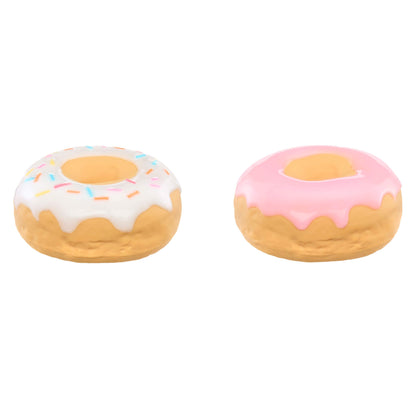 Two donut-shaped toys with different toppings on a white background