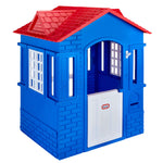 Blue playhouse with a red roof on a white background