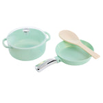 Set of green toy cookware with a lid and wooden spoon on a white background