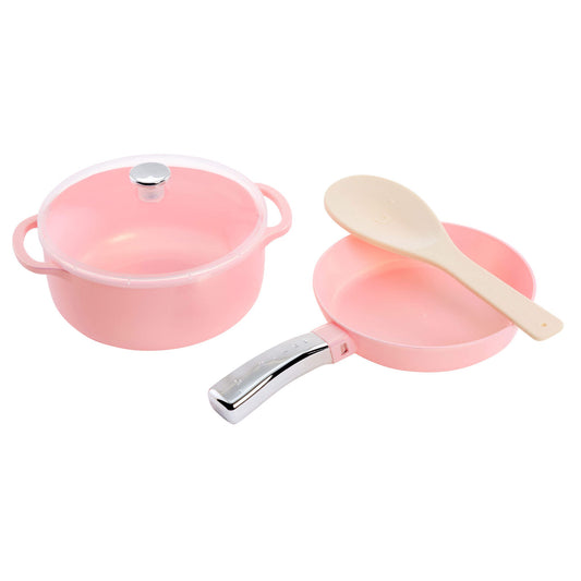 Pink toy cookware set with a wooden spoon on a white background