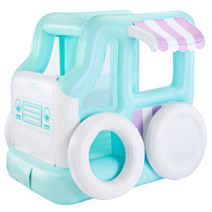 An inflatable play structure shaped like a retro ice cream truck, featuring a light aqua and white body with a pink and white striped awning, isolated on a white background.